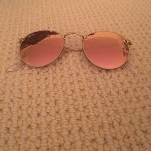 rose gold round Ray Ban sunglasses
