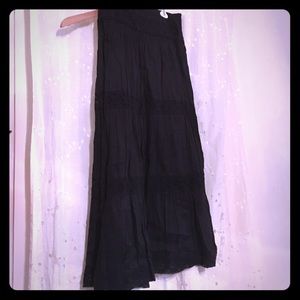 Small long black lacey cotton skirt