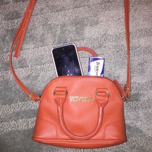 Used Kenneth Cole reaction crossbody mini bag
