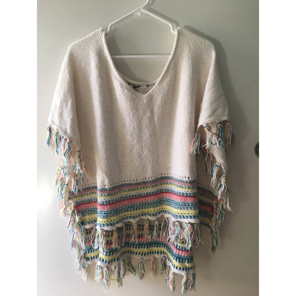 Women's Roxy Cream Poncho Top w/ colored stripes.