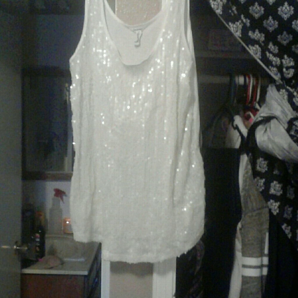 Very cute off white sequins top