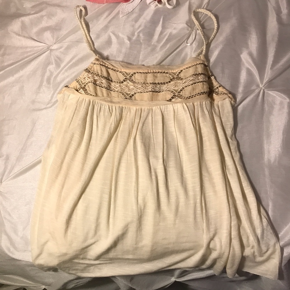 Creme tank top with lace detailing on top