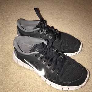Nikes free 5.0 black . Sz 3.5 kids = 5 women's