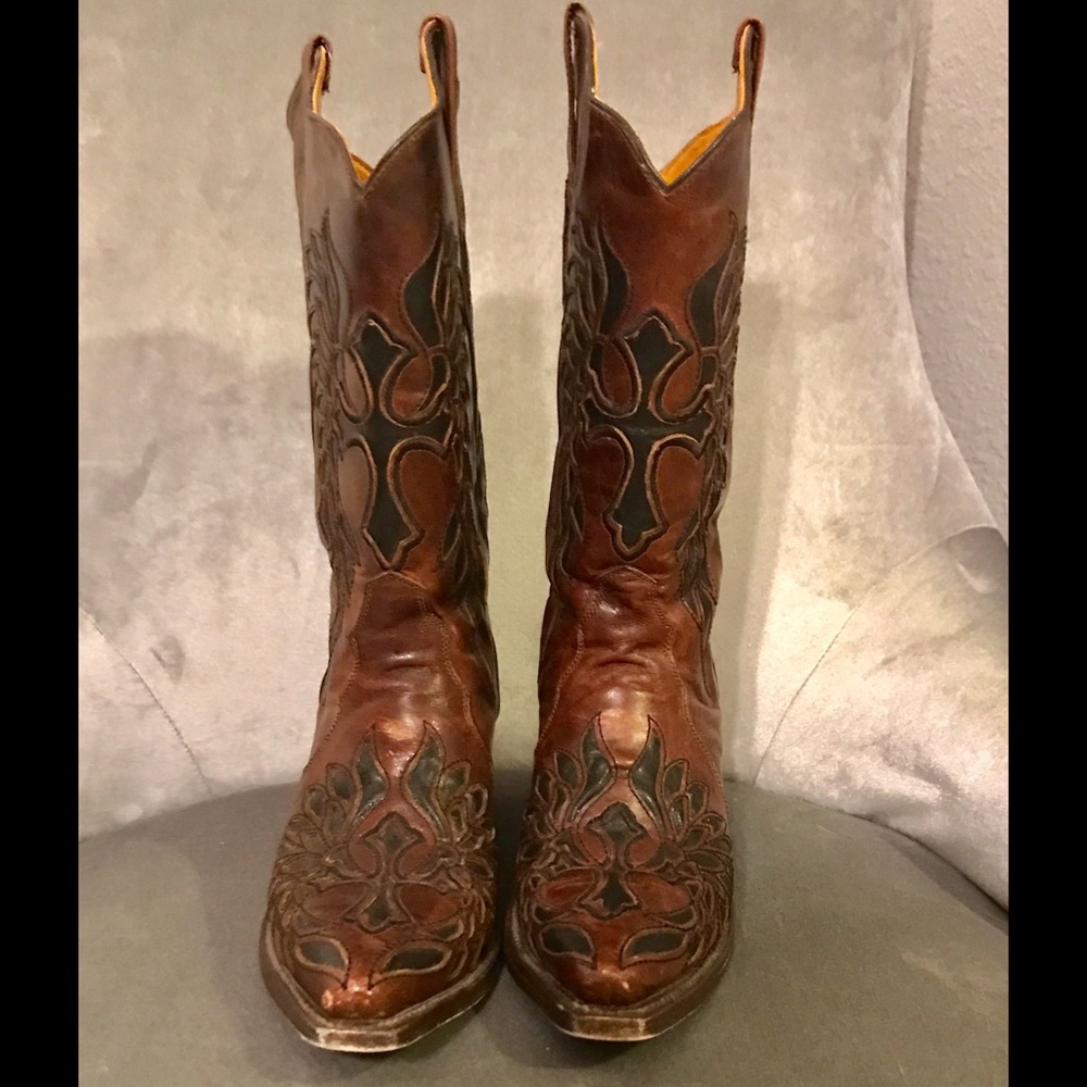 Brown and black cowboy boots