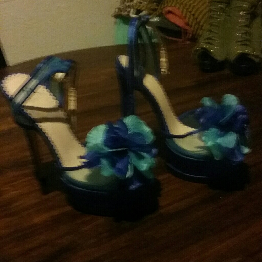 Blue flower  on top  of  6inch heels