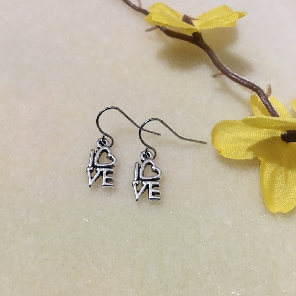 NWOT Silver LOVE Earrings