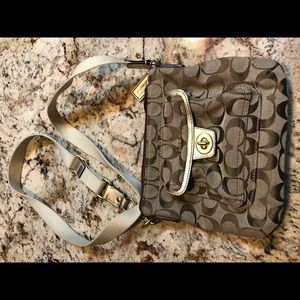 COACH brown canvas cross-body bag.
