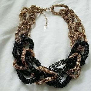 Black and gold mesh statement piece