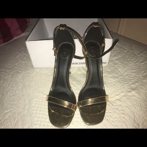 Gold, never worn heels.