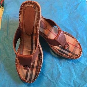 Brown leather Burberry wedge sandals.