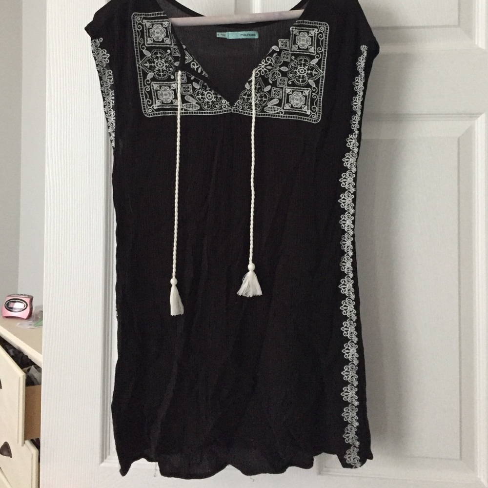 Maurice's embroidered tunic