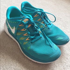 Teal Nike free runs