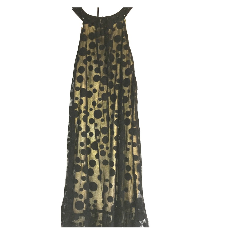 gold neck high dress with black polkadot cover