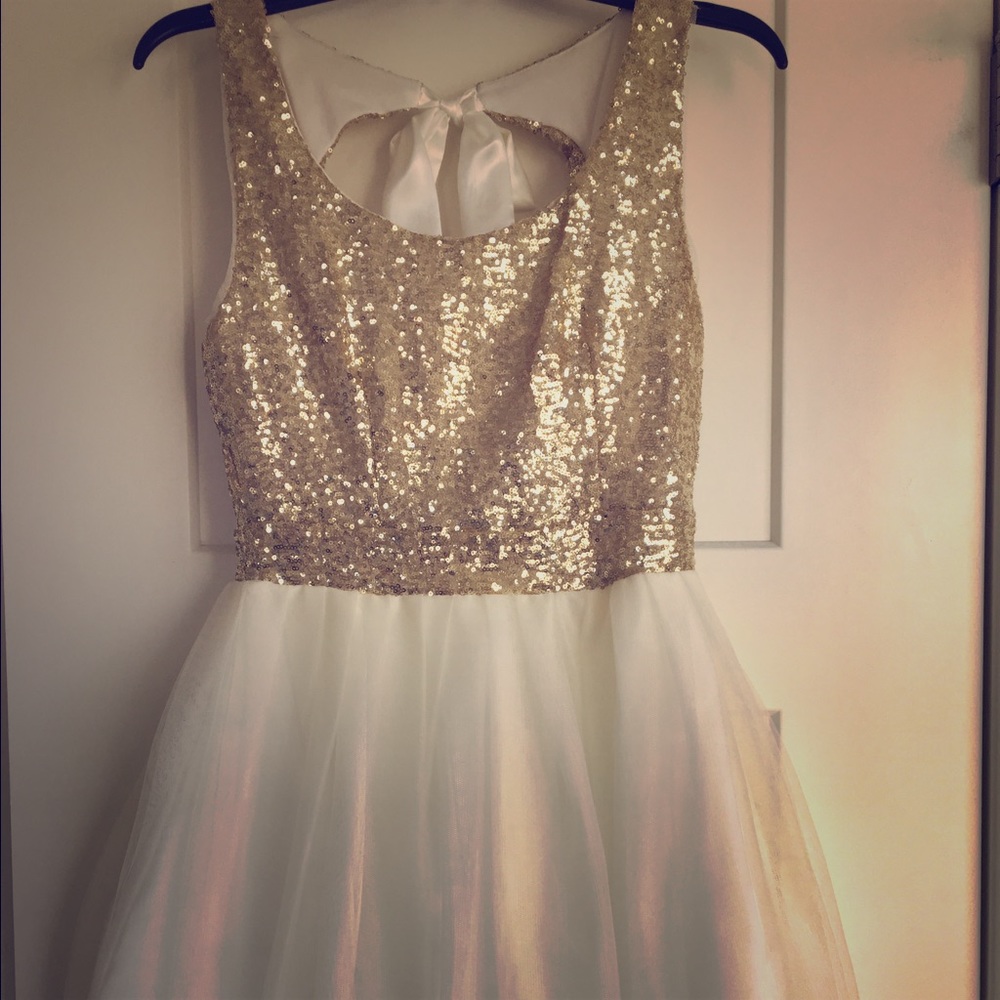 Gold and cream colored formal dress