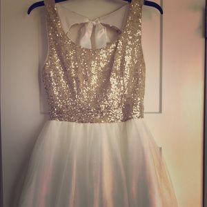 Gold and cream colored formal dress