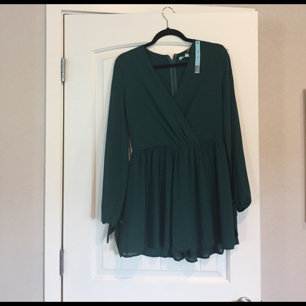 She and Sky teal romper brand new!