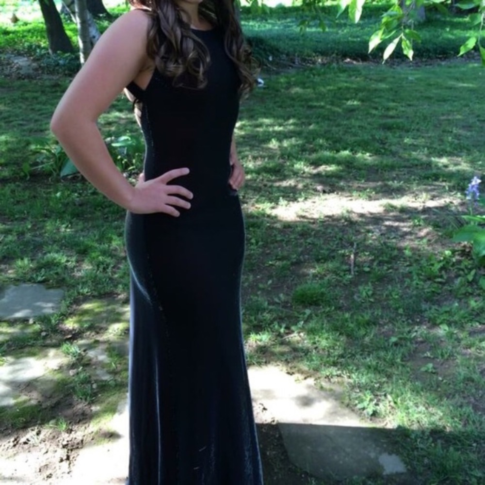 Black formal gown with shimmer look. Size 4.