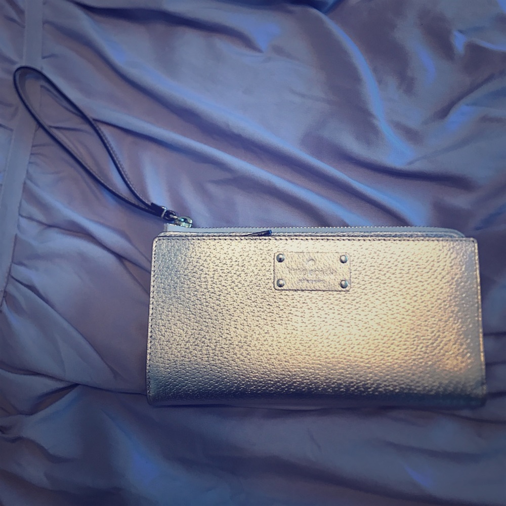 Kate Spade rose gold metallic wristlet