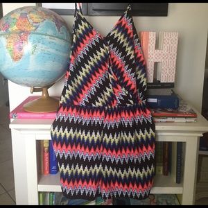 Multicolored romper with pockets