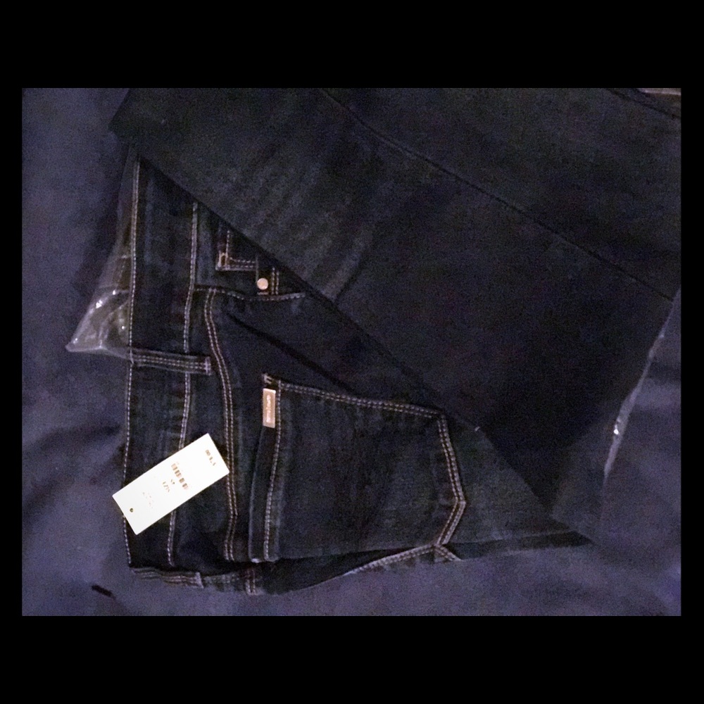 NWT dark blue jeans size 4