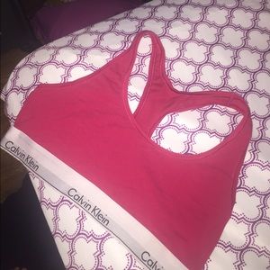 Selling pink Calvin cline sports bra