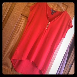 Bright red/orange blouse with gold zipper accent