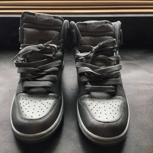 Size 8.5 Nike Silver High Tops.