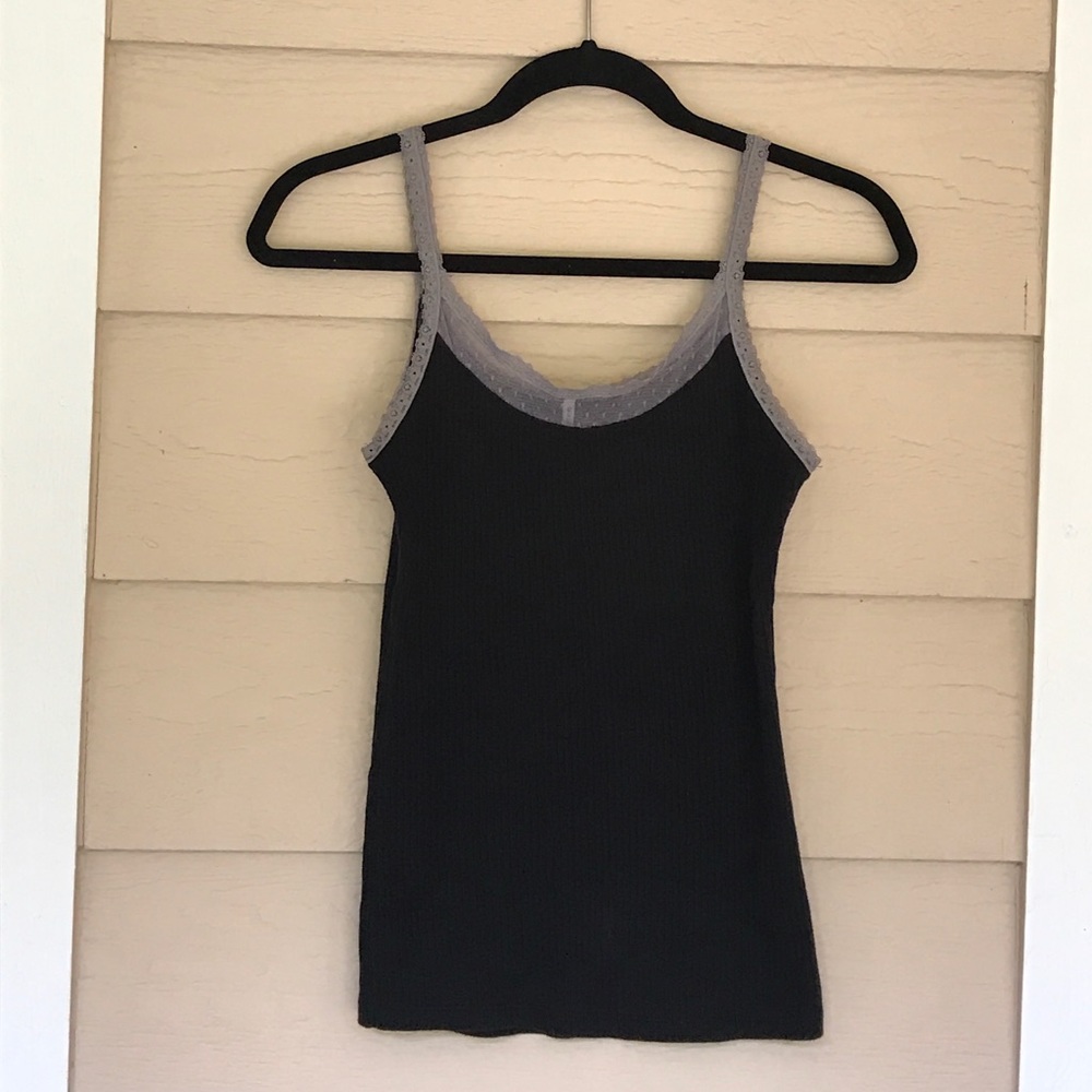 Black tank top with lacy straps.