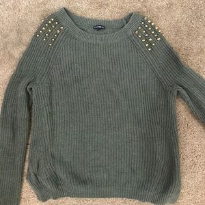Olive green sweater with gold spikes on shoulders