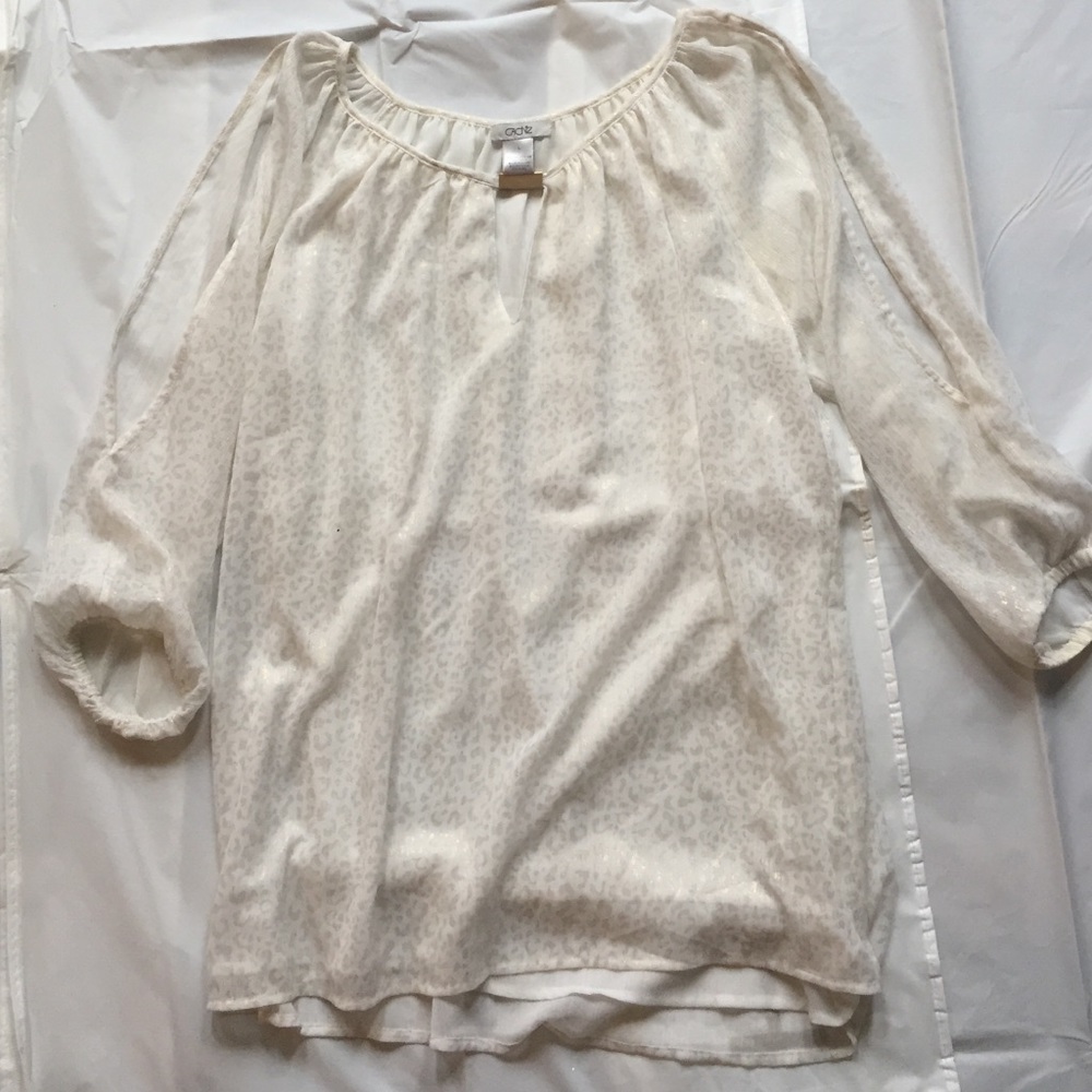 Cache Cream with gold animal print blouse