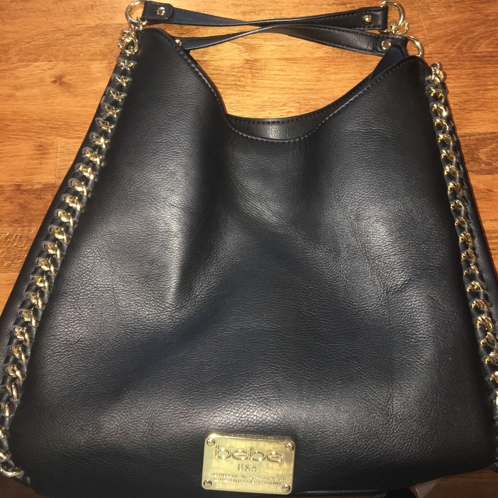 Bebe Black Handbag with Gold Chain Accent