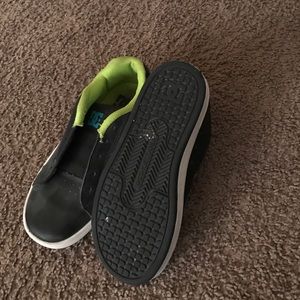 Size 3 DC shoes. Black with green used still great