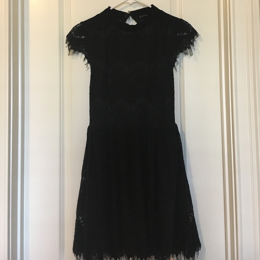 Black lace open back fit and flare dress