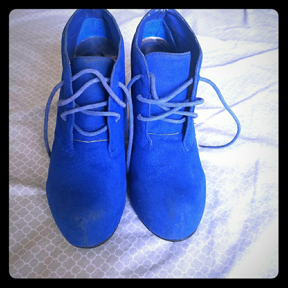 Blue wedge boots