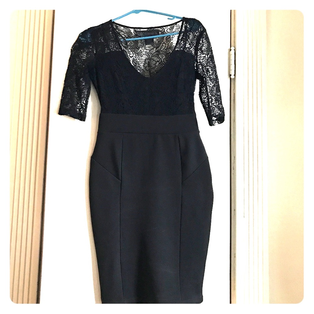 Kardashian Kollection black spliced lace dress.