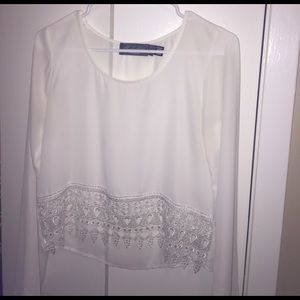 Francesca's white crotchet blouse.
