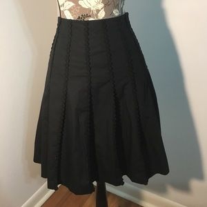 Black skirt with black flower details