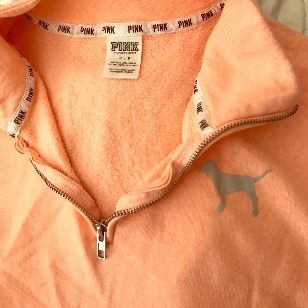 Peach colored Victoria's Secret Pink sweat shirt.