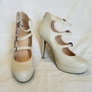 Cream buckled heels