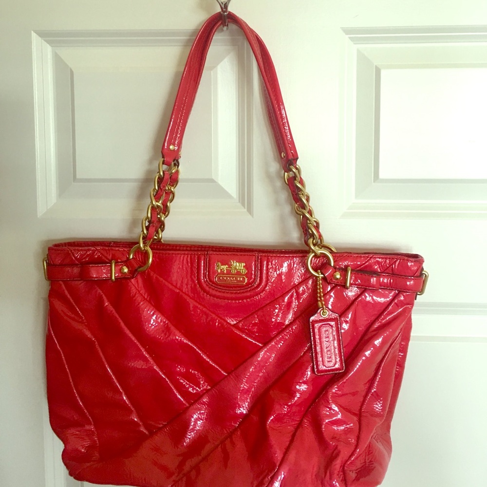 Coach handbag in rich poppy color