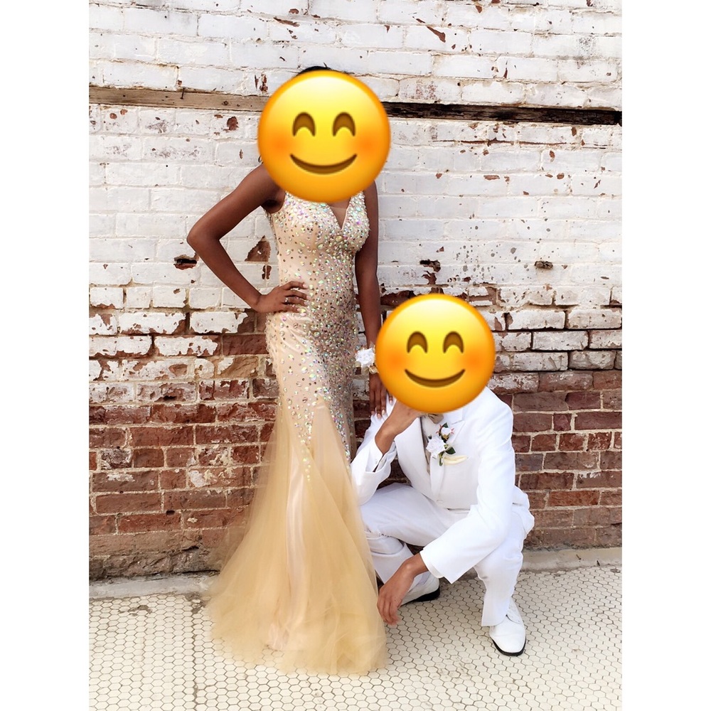 Champagne (gold) prom dress.