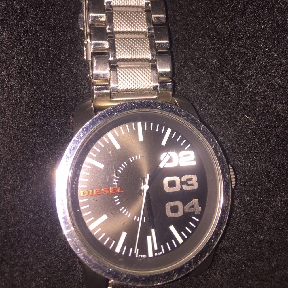 Men's silver stainless steel diesel watch.