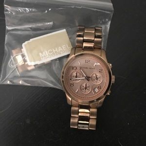 Micheal Kors rose gold watch