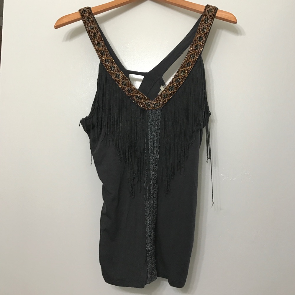 Fun evening top with fringe and beaded accents!