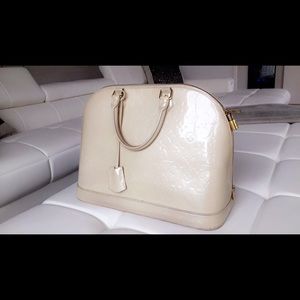 Alma GM Monogram Shiny Vernis Leather beige