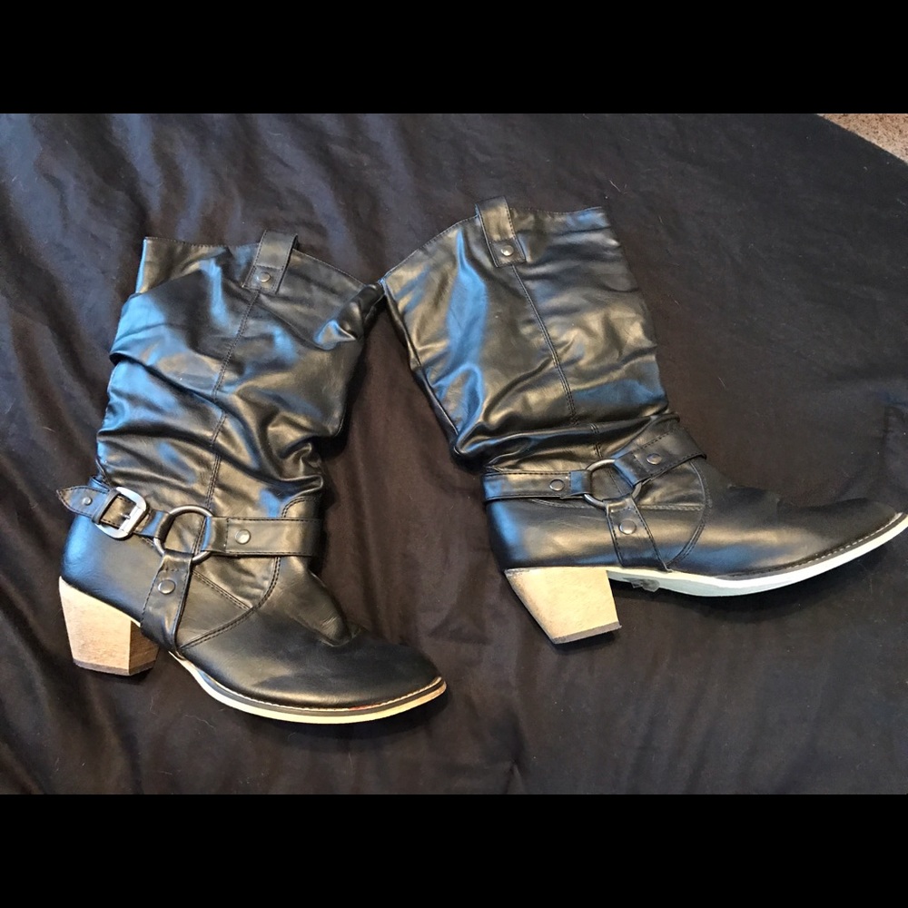 Black Boot with heel. Size 9.