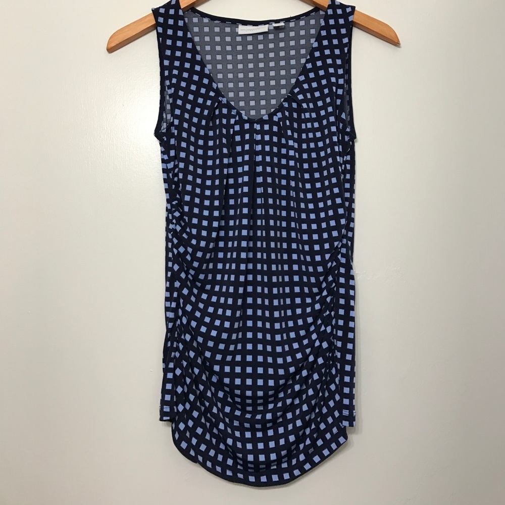 Professional tank top with ruched sides.