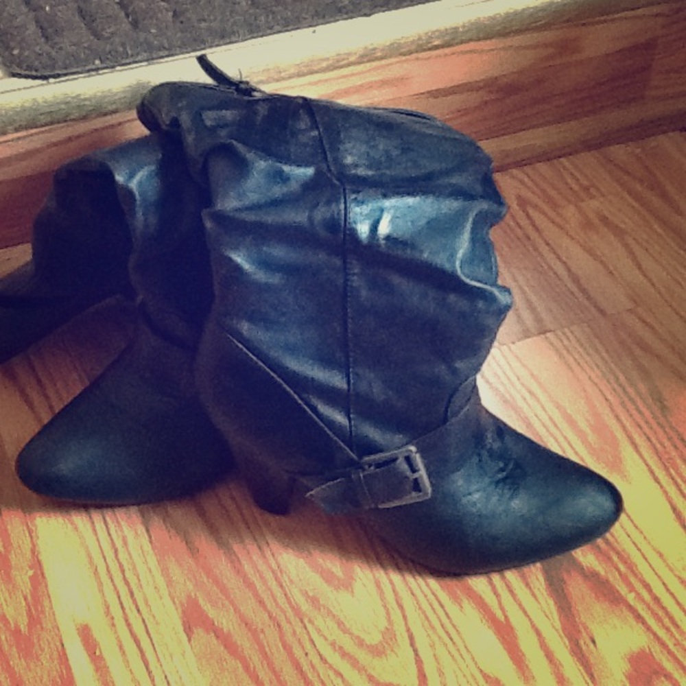 Black knee-high Rampage boots
