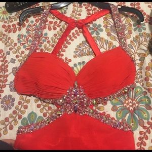 Bright red orange prom dress with cut outs