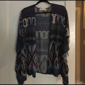 Light weight shrug. Perfect for spring or fall.